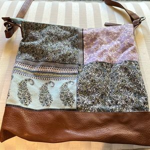 JJill purse, cotton fabric and brown leather strap and bottom. Barely used
